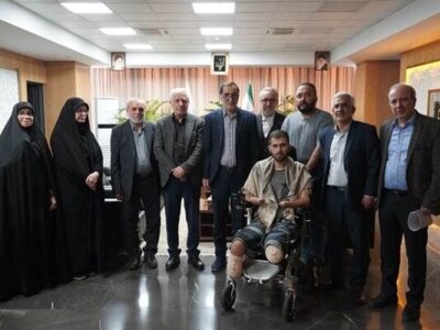 دیدار رئیس بنیاد شهید و امور ایثارگران با جانباز سرافراز حسین محمدی